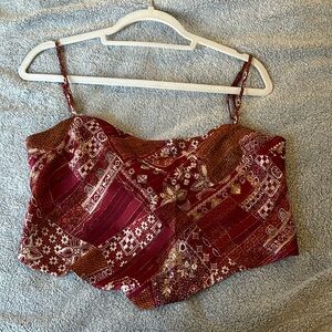Super cute top! Pair with jeans or shorts :)